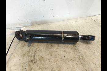 salg af New Holland T6070  Front axle steering cylinder