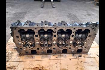 salg af New Holland B115C  Cylinder head